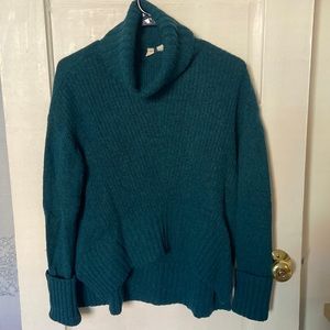 Dark green turtle neck sweater